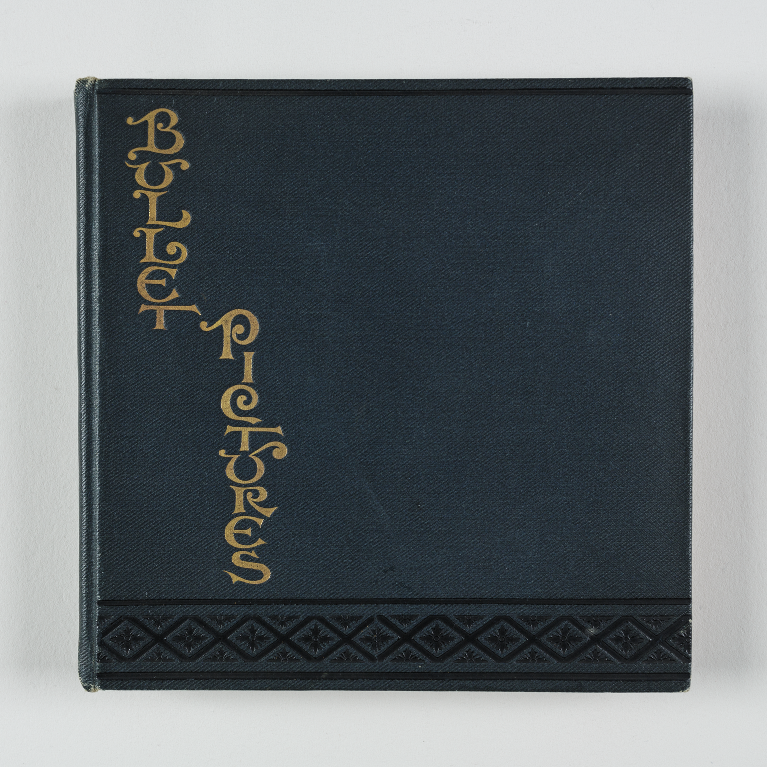 Front cover of photographic album entitled 'Bullet Pictures'. Made by Eastman Kodak, 1896