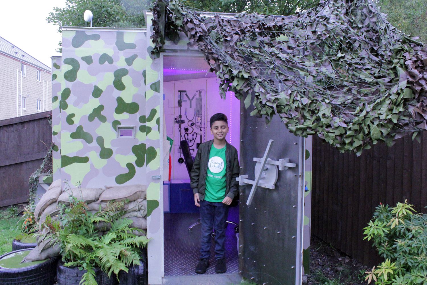 Yusuf Karim outside his den built by The Dengineers