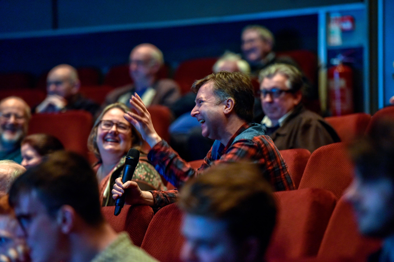 Audience members during Theo Gluck's presentation