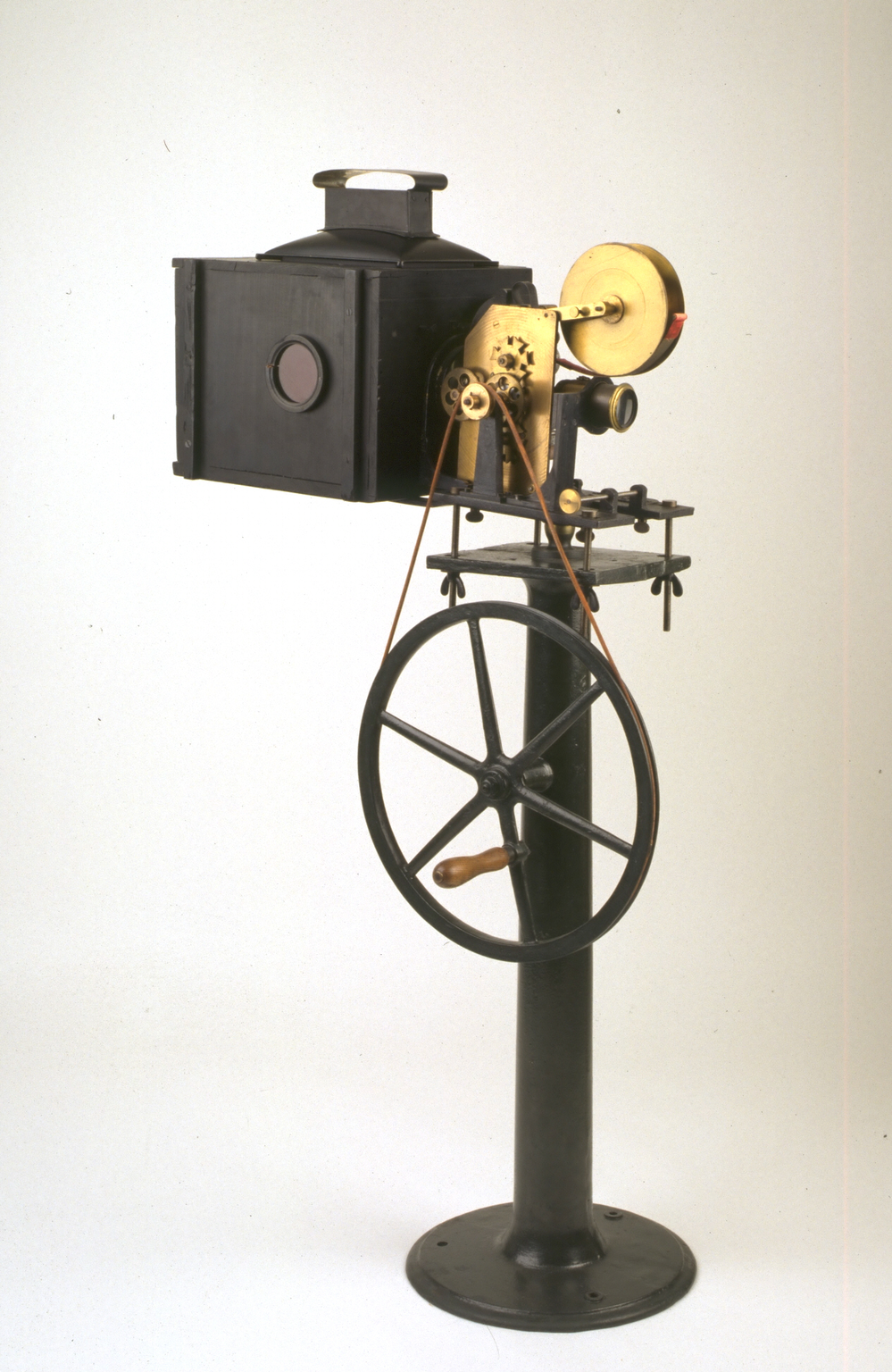 Paul's Theatrograph Projector No 2 Mark 1 was made in Britain in 1896. This is a general view from the left-hand side, showing the winding handle.