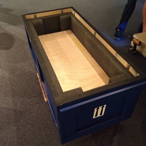 Ellis daguerreotypes being packed in the crate