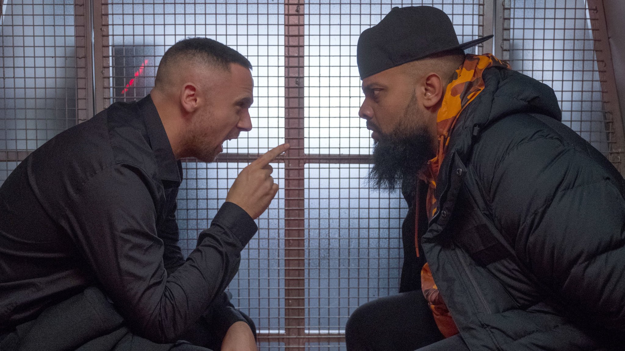 A scene from BBC’S Man Like Mobeen – a far-right activist sits in the same police van as Mobeen, the show’s Asian protagonist