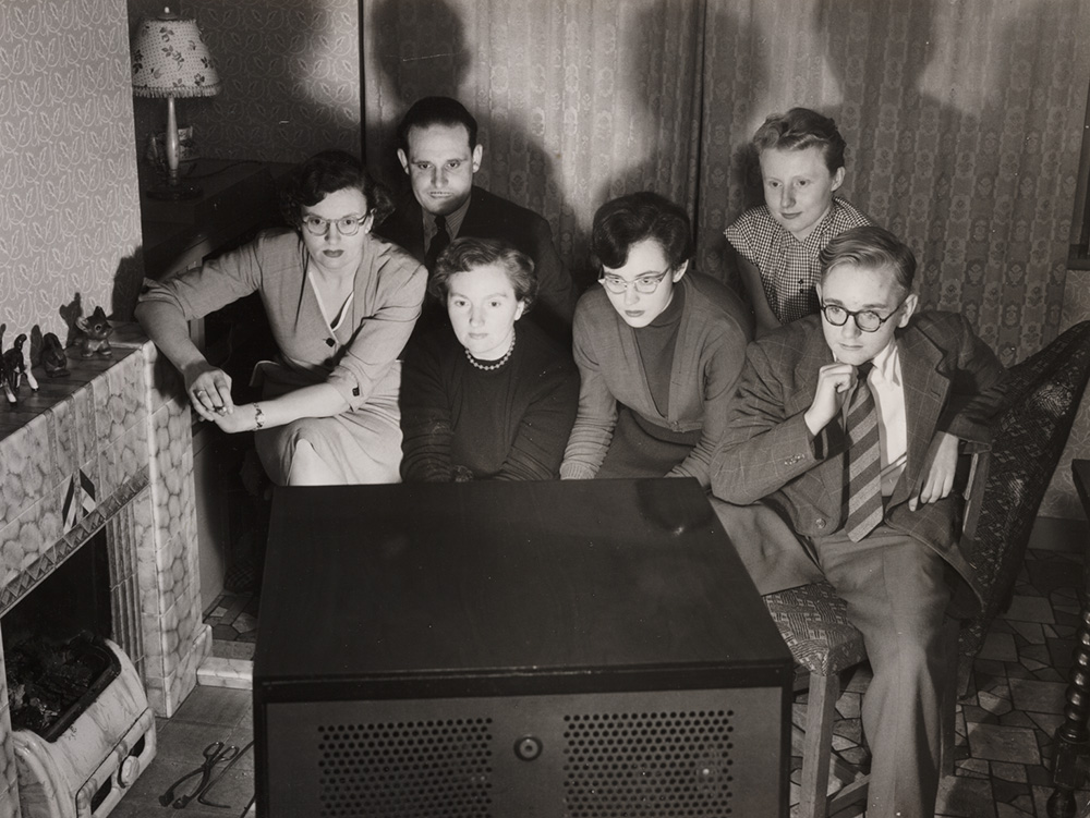 Group of people watching television