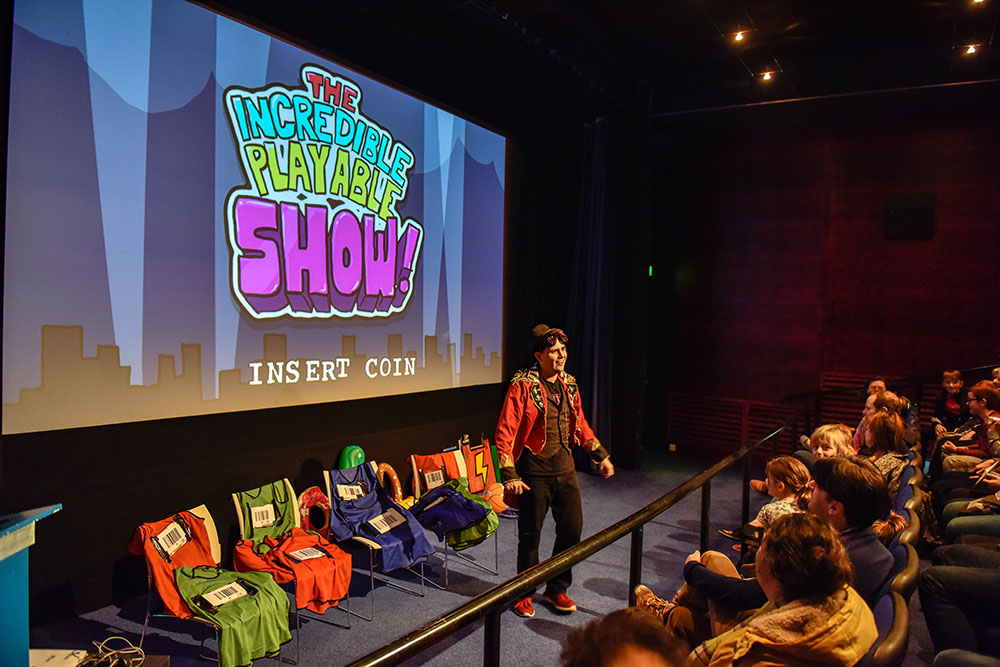 Audience watching Incredible Playable Show in Cubby Broccoli cinema
