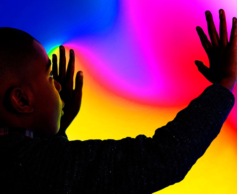 Child playing with a sensory exhibit in Wonderlab