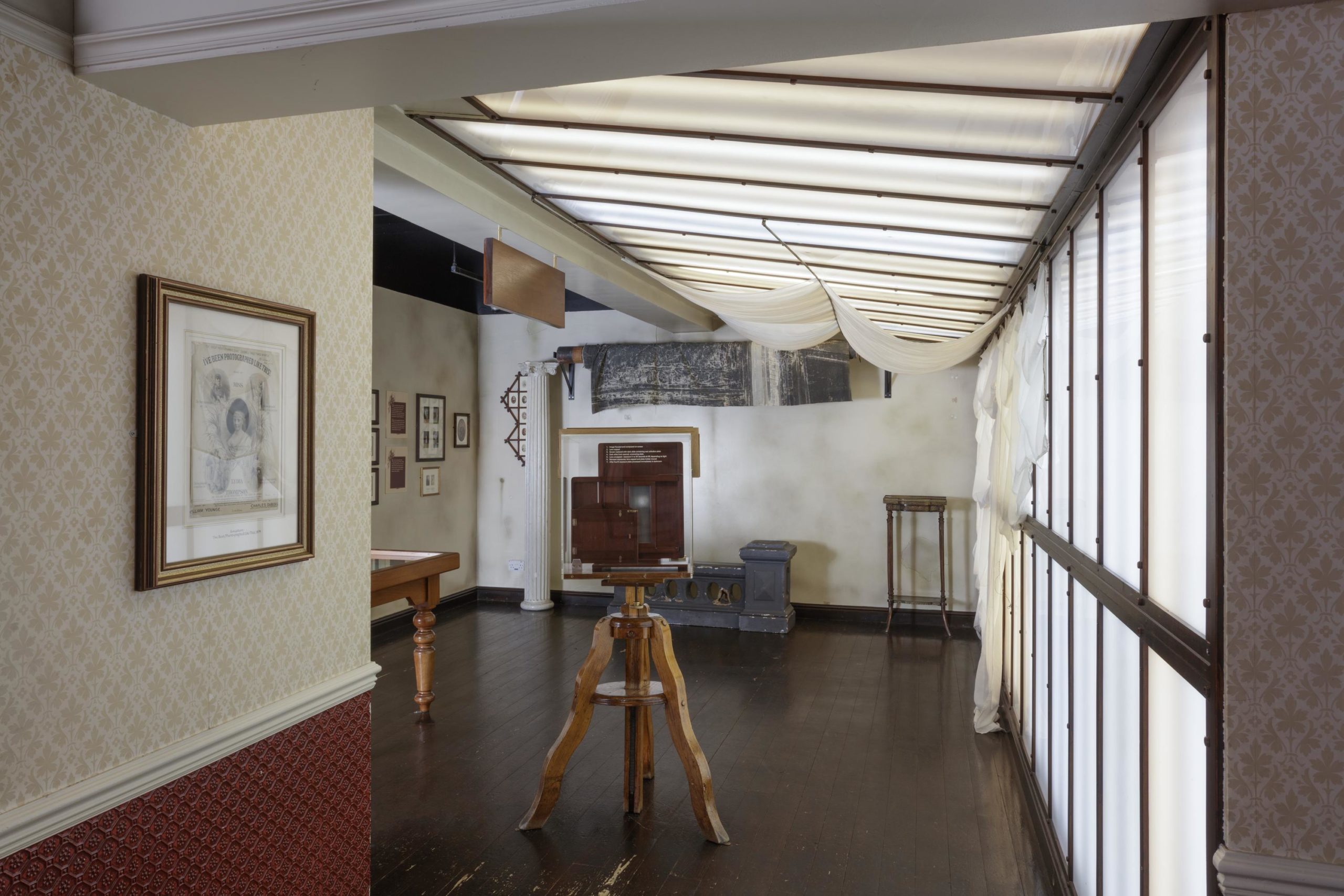 Daylight Studio before remodelling, with curtained area and old camera