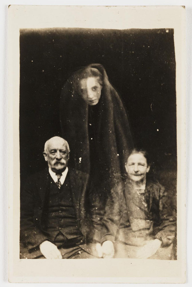 Photograph of an elderly couple with a young female ‘spirit’ by William Hope