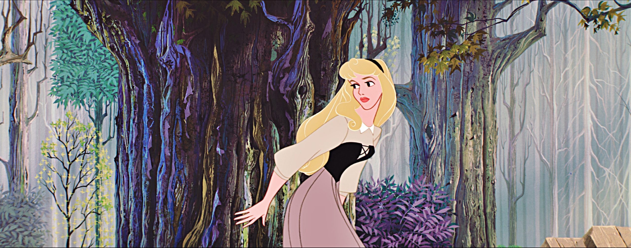 Still from Disney's animated Sleeping Beauty, showing Beauty peering around a tree in the forest