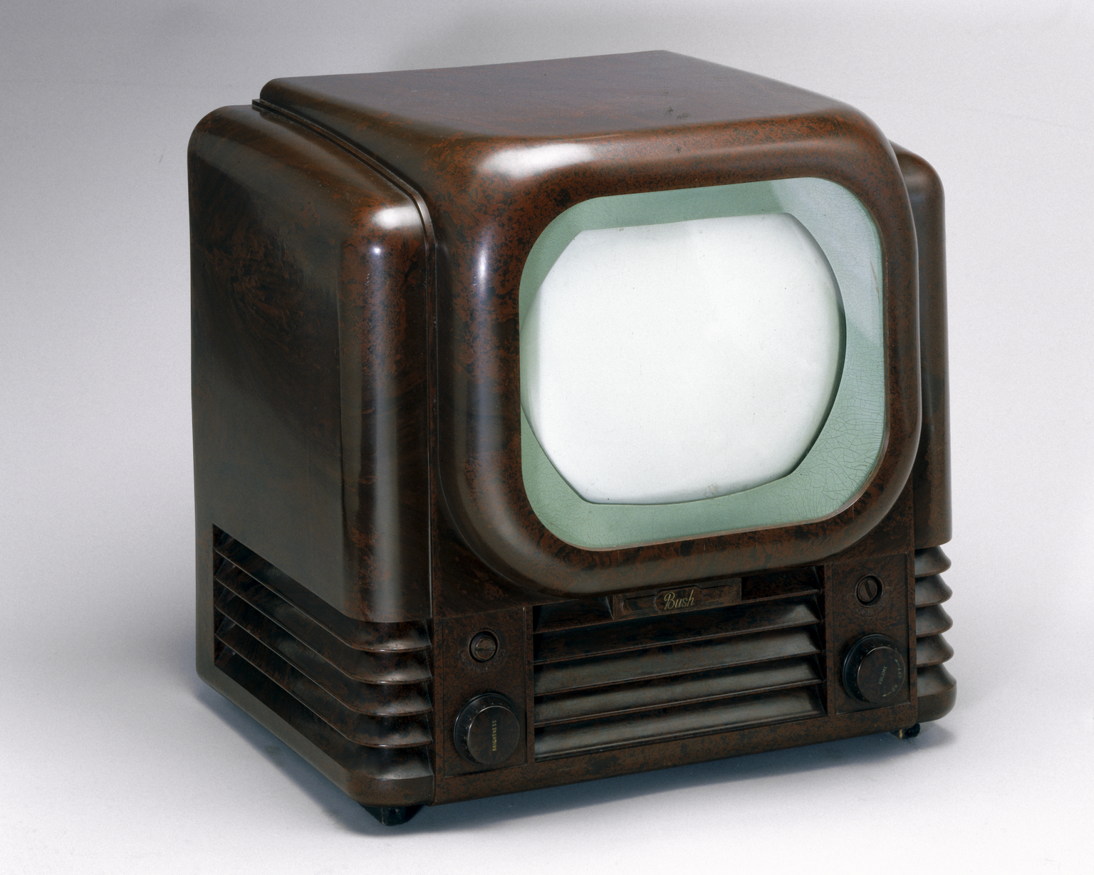 1950s television set in a dark veneer finish with small screen 