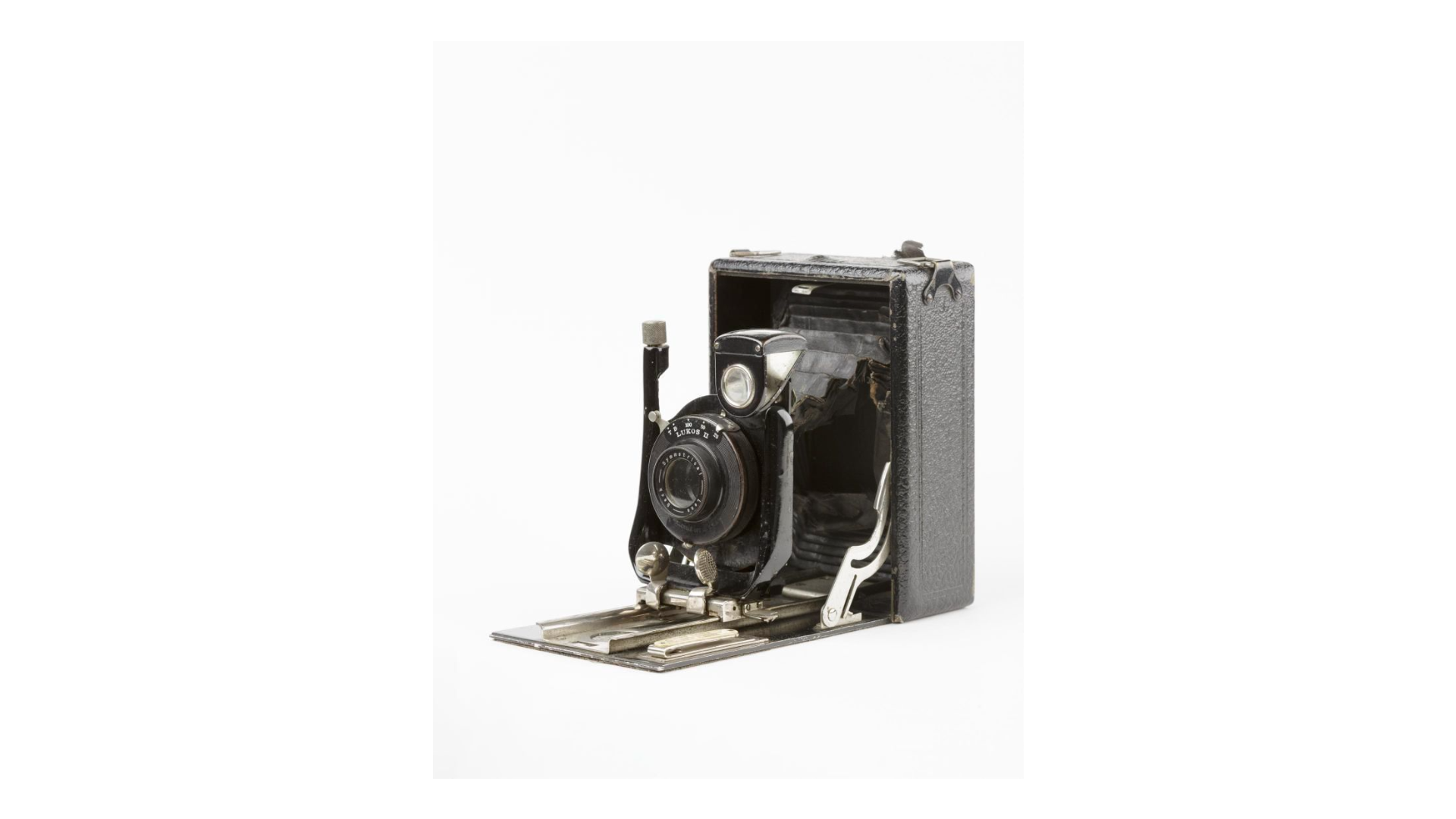 A box camera, opened to show the lens and viewfinder