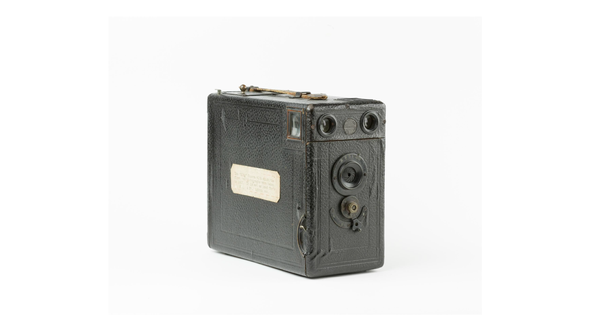 A box camera with a label on the side
