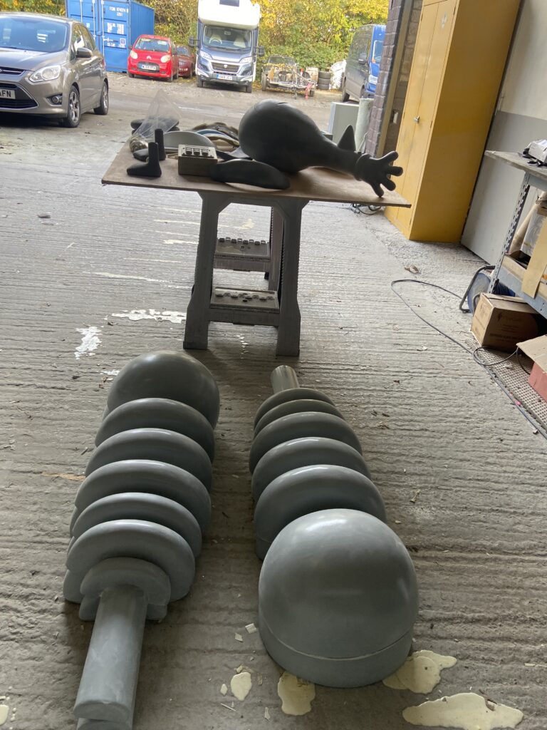 The unpainted Techno Trousers legs on the workshop floor