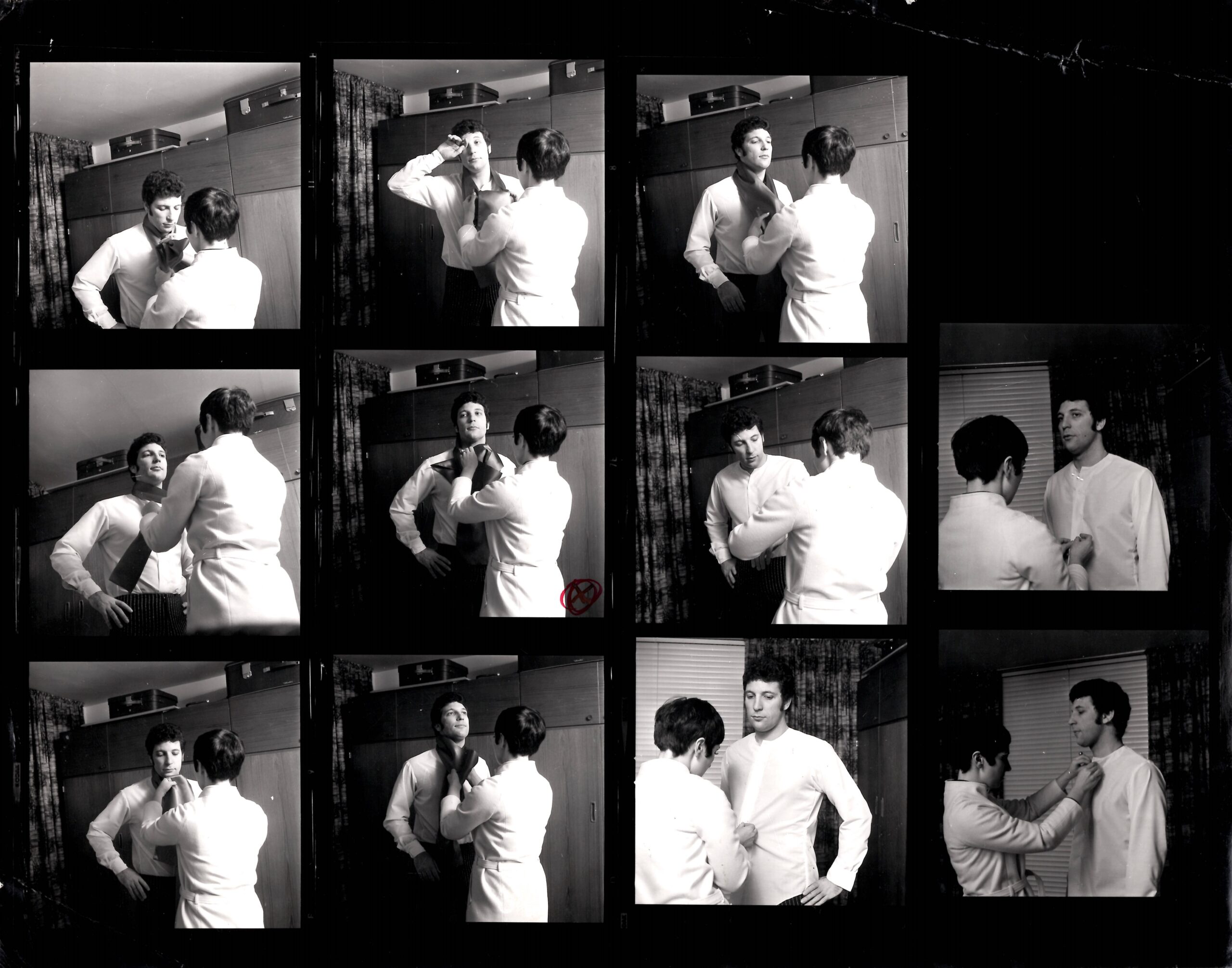 Contact sheet with 9 photographs of Tom Jones and a dresser