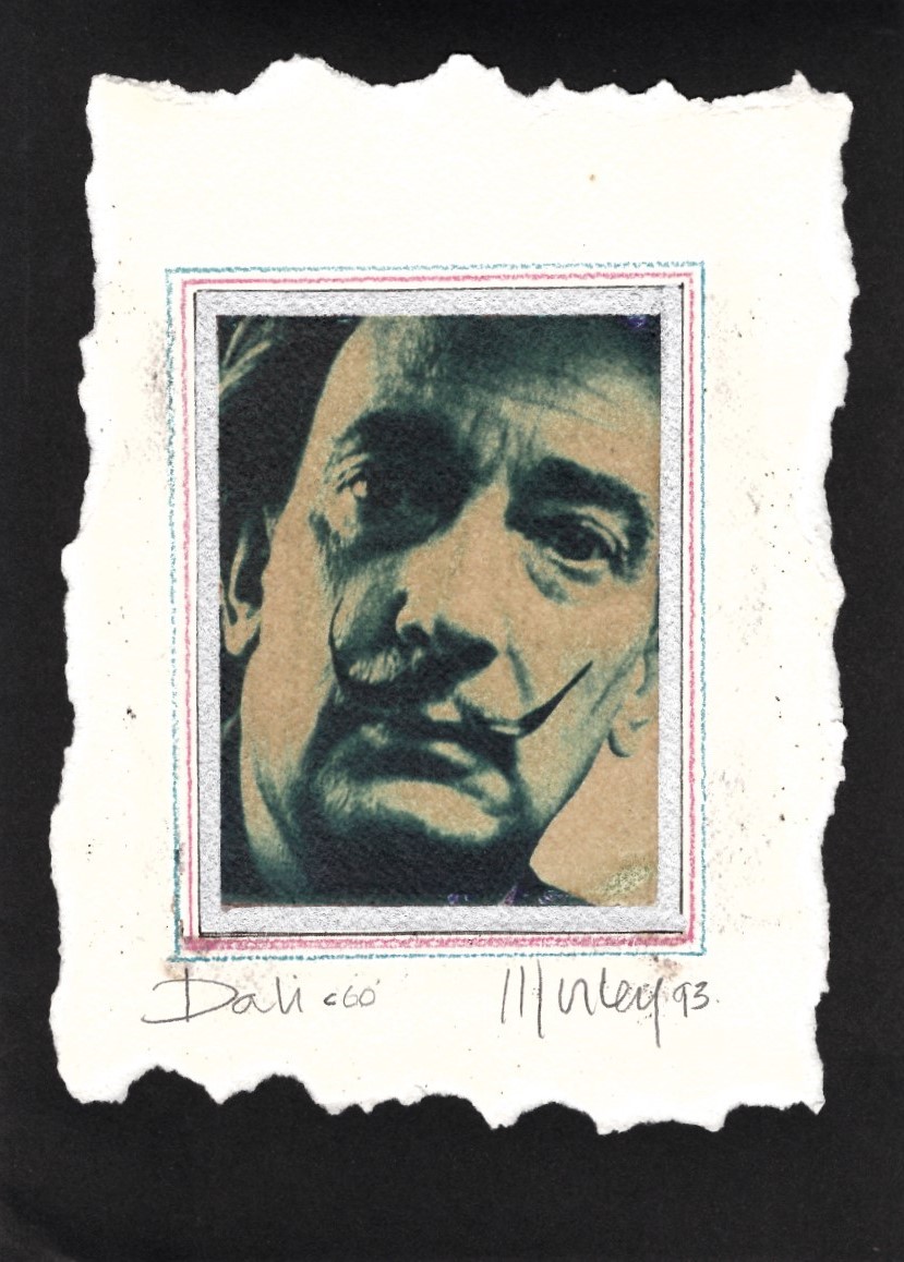 Headshot of Dali printed on white paper with torn edges