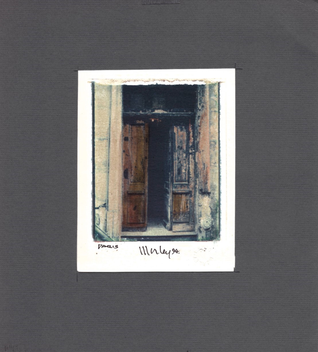 Small photograph of an open wooden door
