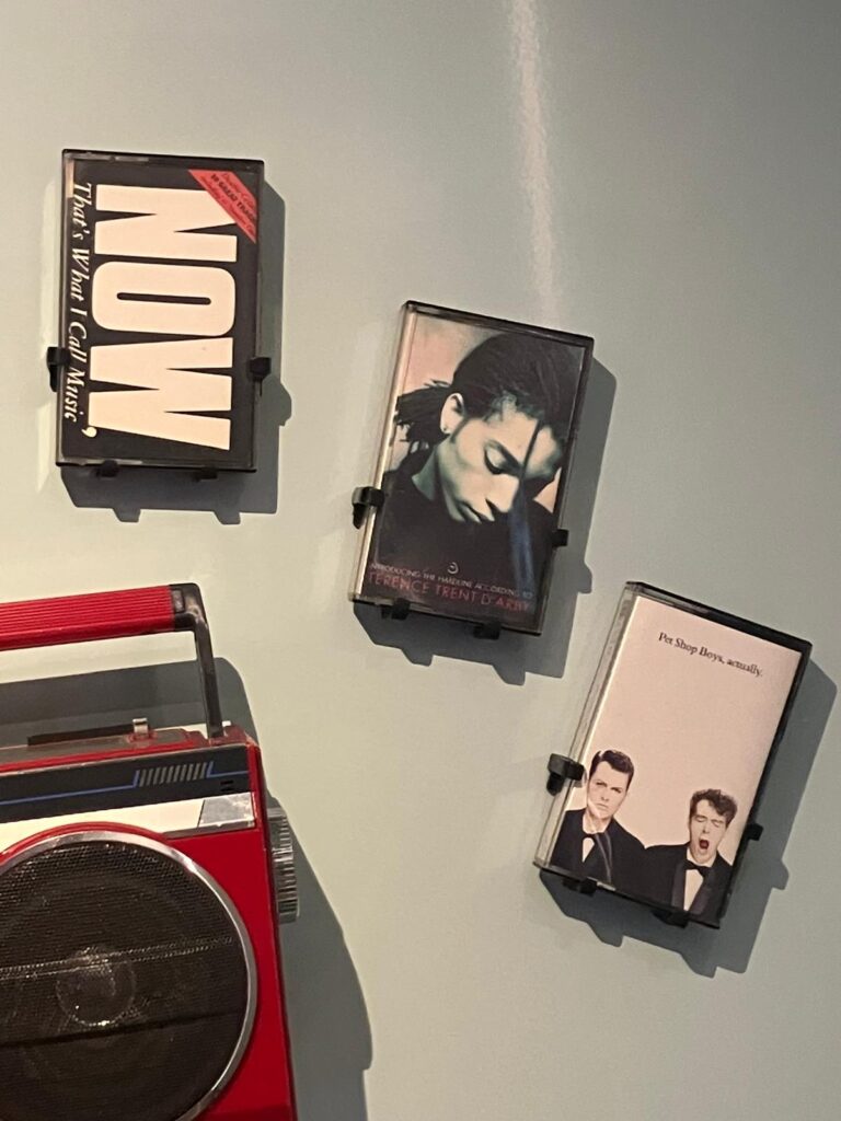 Cassette tapes of Terence Trent Darby, Pet Shop Boys and Now That's What I call Music on display