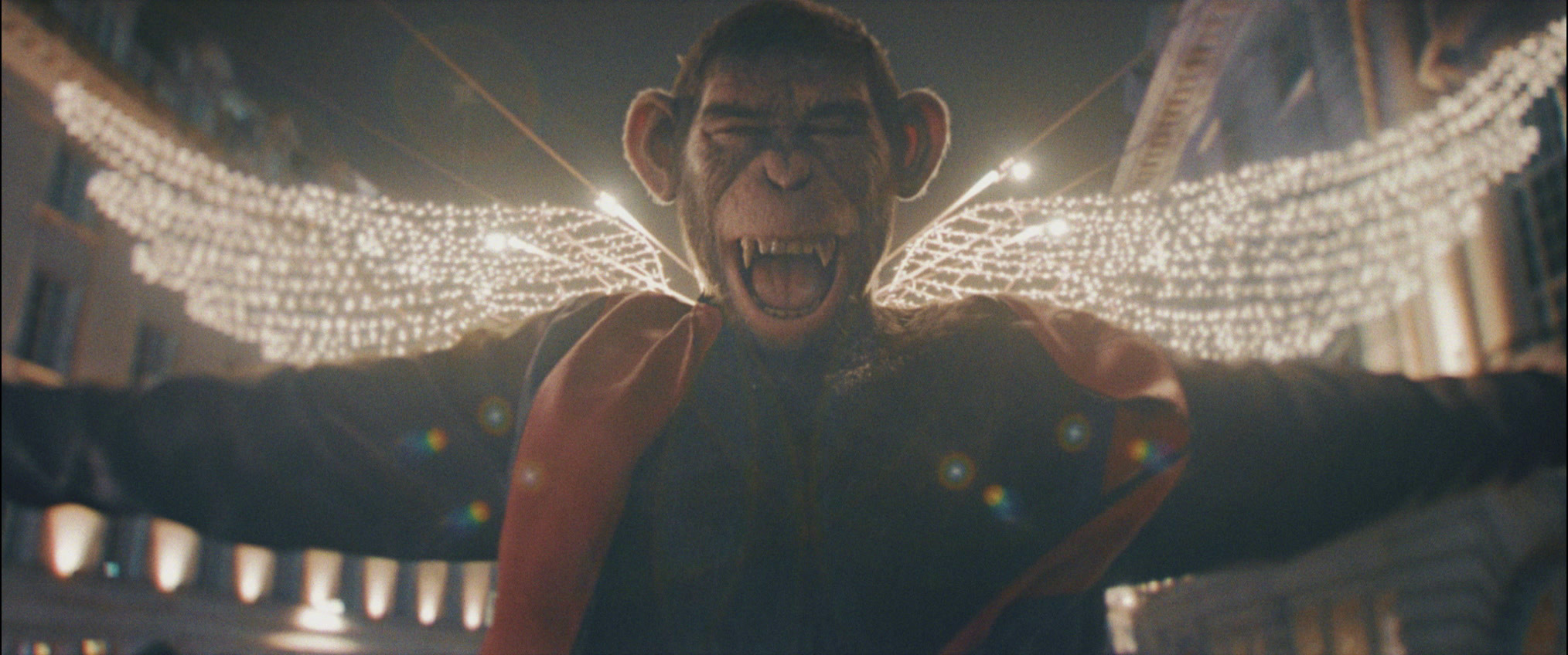 A humanoid chimpanzee wearing an orange vest exclaims with arms out wide. Lights behind him look like he has wings.