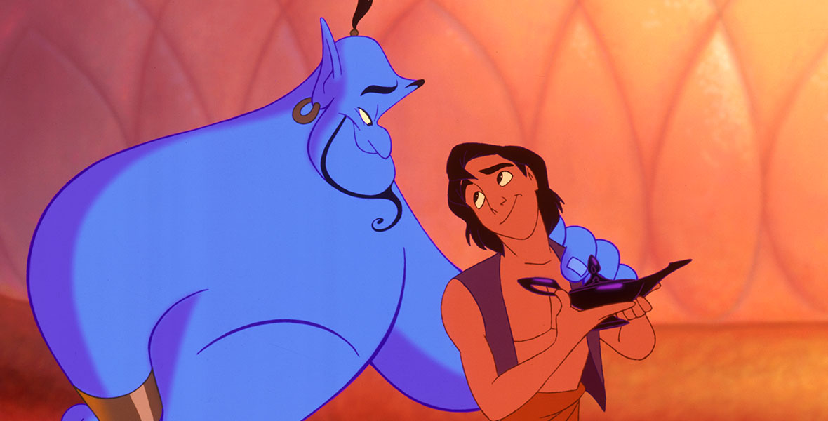 Genie puts his arm around Aladdin, who holds the lamp