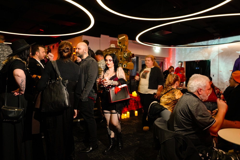 Pictureville bar crowded with attendees of the Dracula screening, most of whom wear gothic-inspired outfits